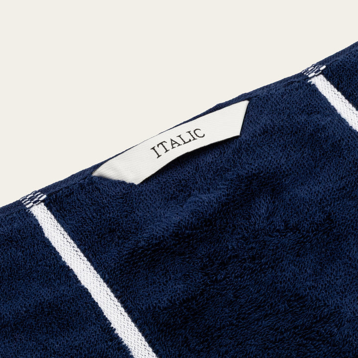 Navy cotton towel edge with white stripe and ITALIO label