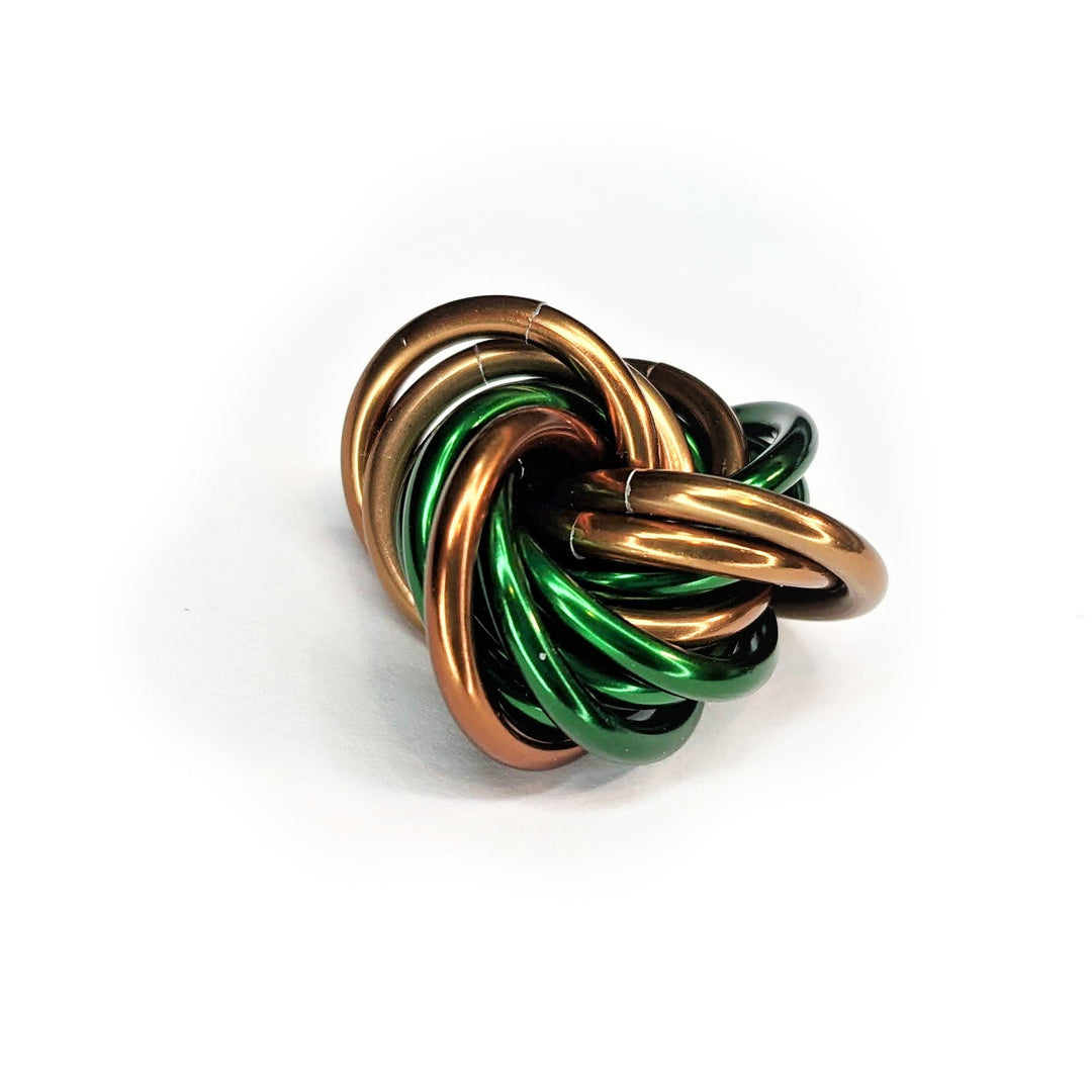 Multicolor metal fidget ball with braided loops, gold green brown and black