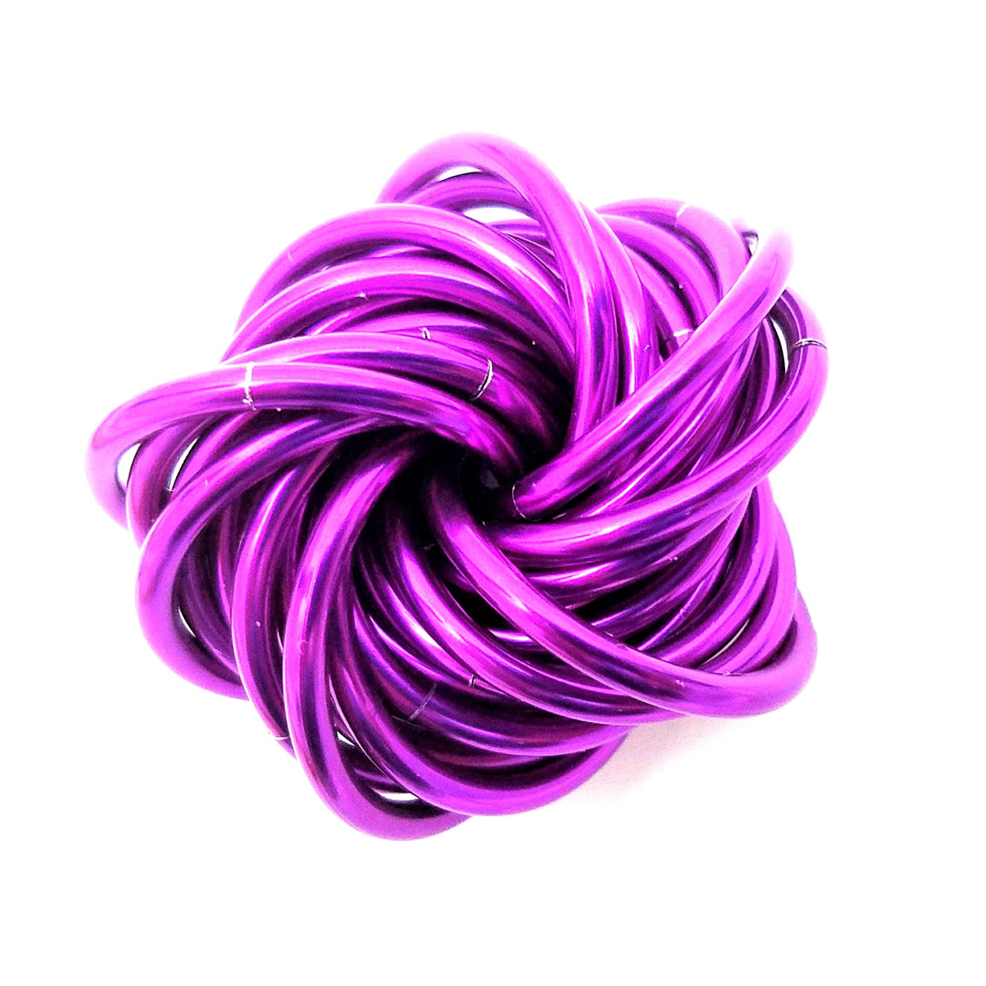 Bright purple metallic stress ball fidget toy, twisted looped cords ball shape.
