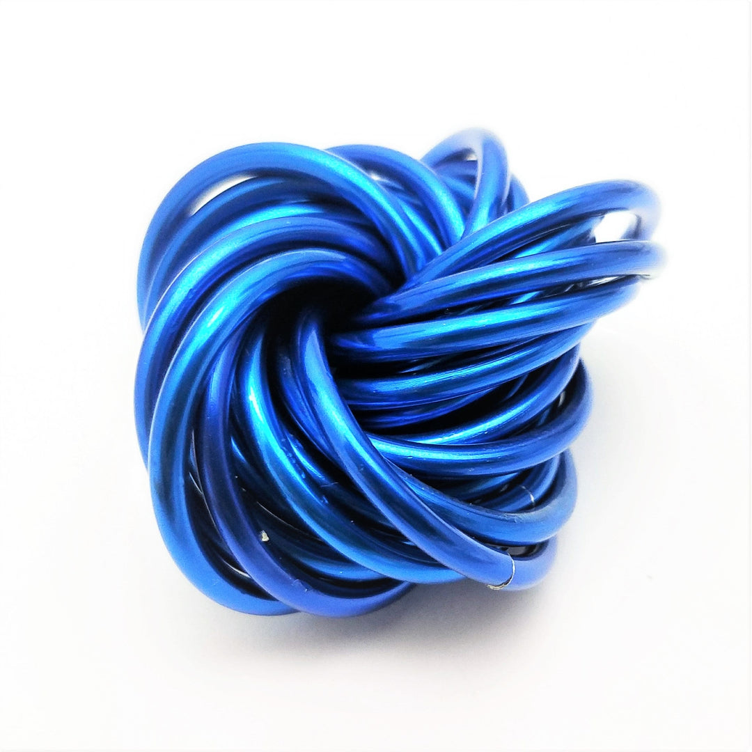 Blue metallic twist fidget stress ball, knotted loop desk toy.