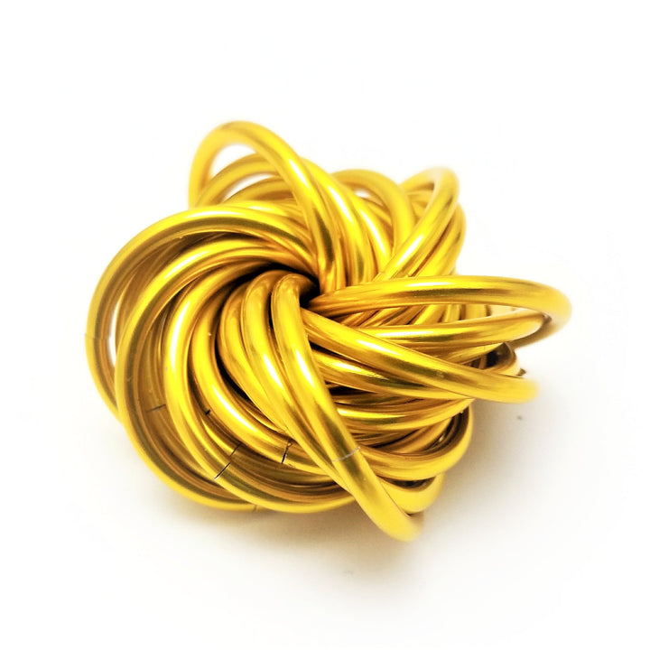 Gold metallic stress ball fidget toy with twisted looped cords ball shape.