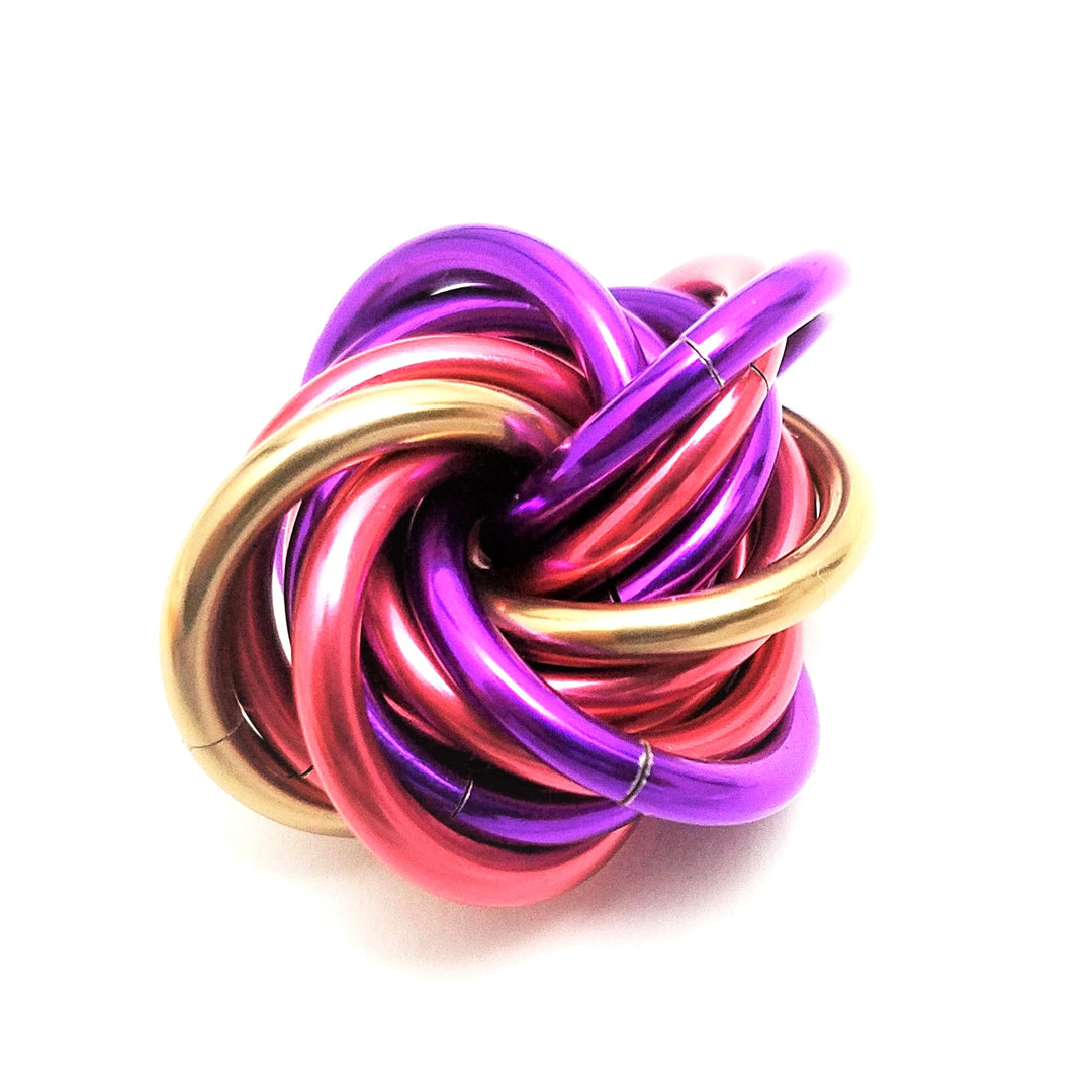 Multicolor metal fidget ball with braided loops, purple pink gold and red