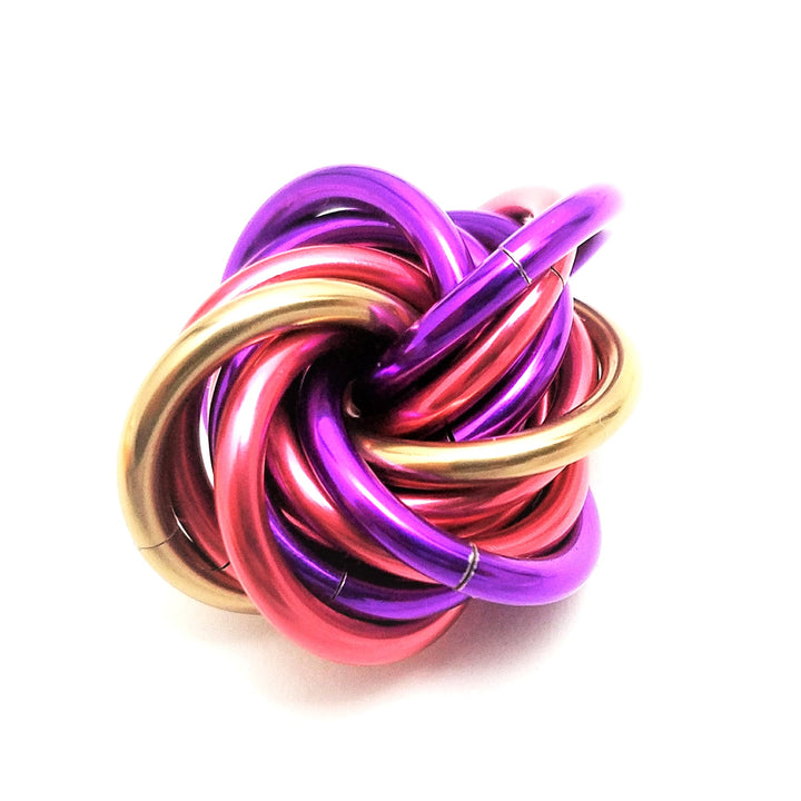 Multicolor metal fidget ball with braided loops, purple pink gold and red
