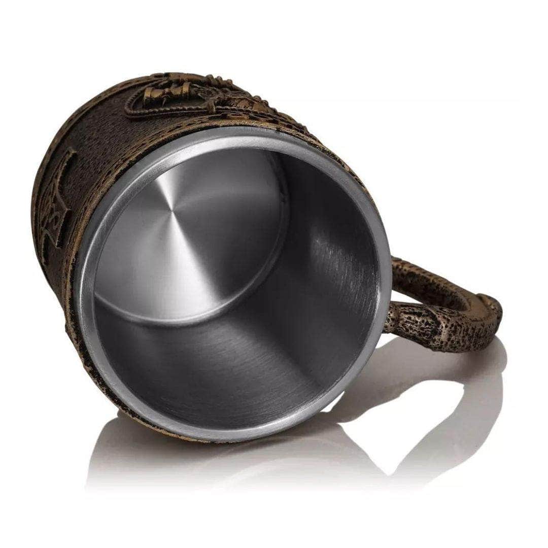 Stainless steel Viking mug showing interior and bronze textured rim with handle