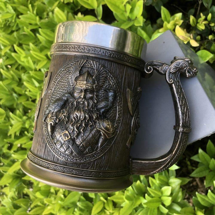 Viking tankard mug with engraved Odin Thor design and curved handle