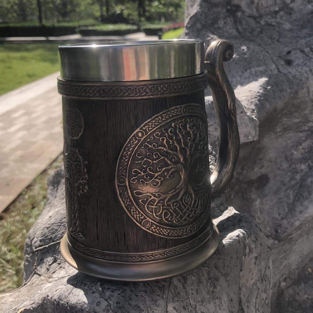 Tree of Life tankard mug with dark woodgrain body and bronze circular tree engraving, curved handle