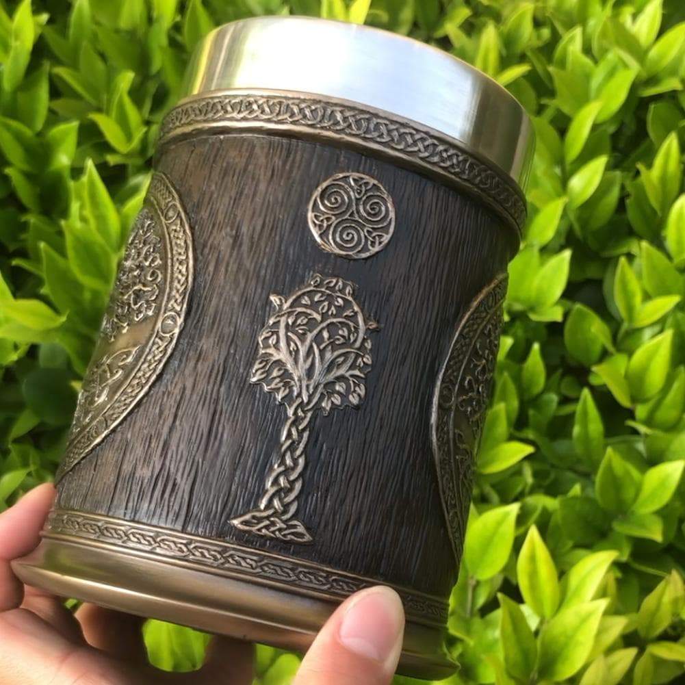 Tree of Life tankard mug side view, dark woodgrain with small tree-and-branch emblem