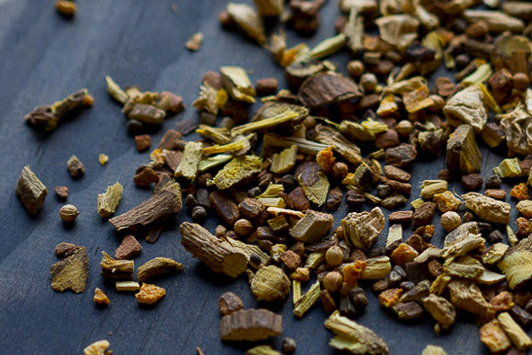 Loose Mystic licorice tea herb pieces scattered