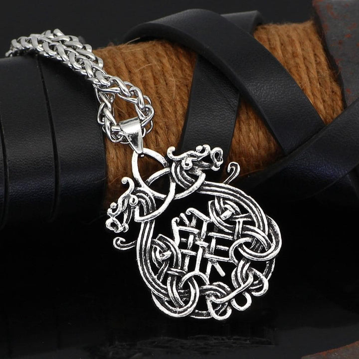 Silver-tone stainless steel dragon Fafnir style pendant on link chain necklace.