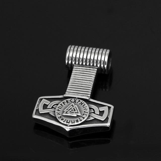 Stainless steel valknut emblem pendant with ribbed bail, close-up on chain