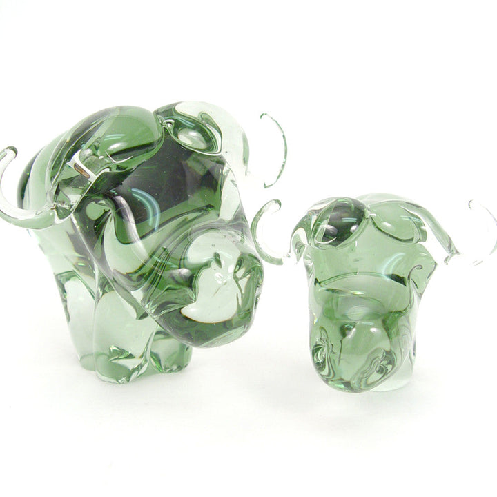 Recycled glass buffalo figurine, translucent green with curled trunk detail