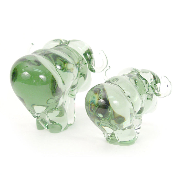 Recycled glass buffalo figurine, translucent green glass with rounded body and legs