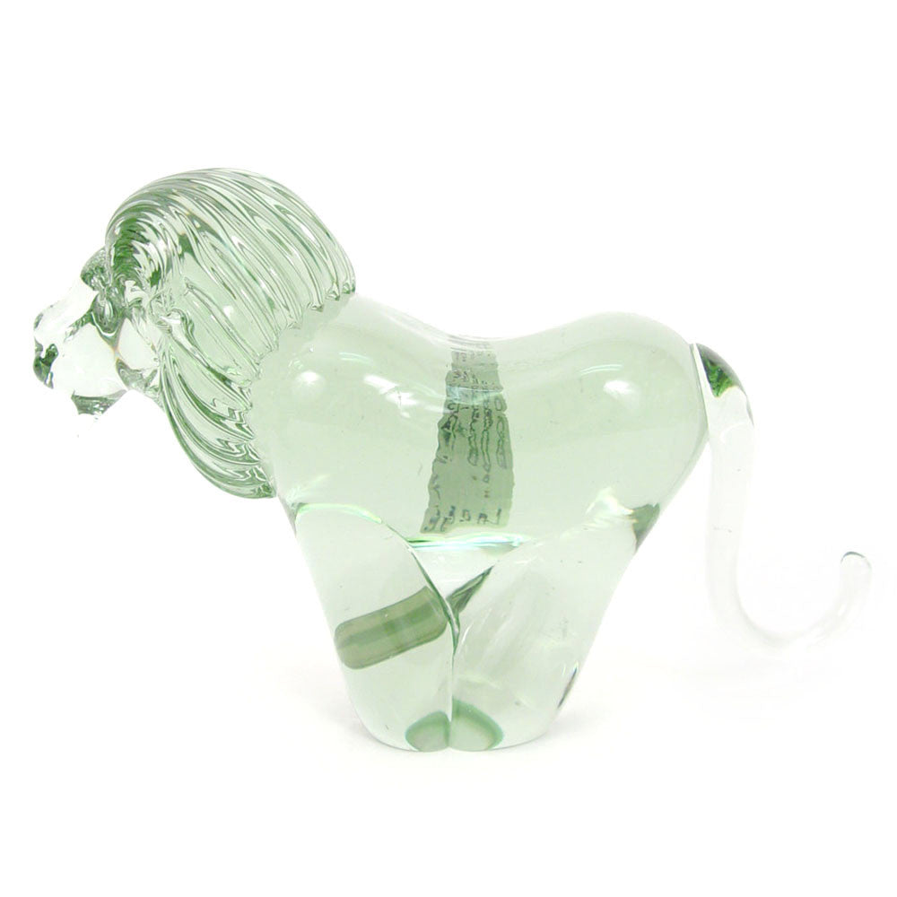 Translucent green recycled-glass lion figurine, side view, tail raised.