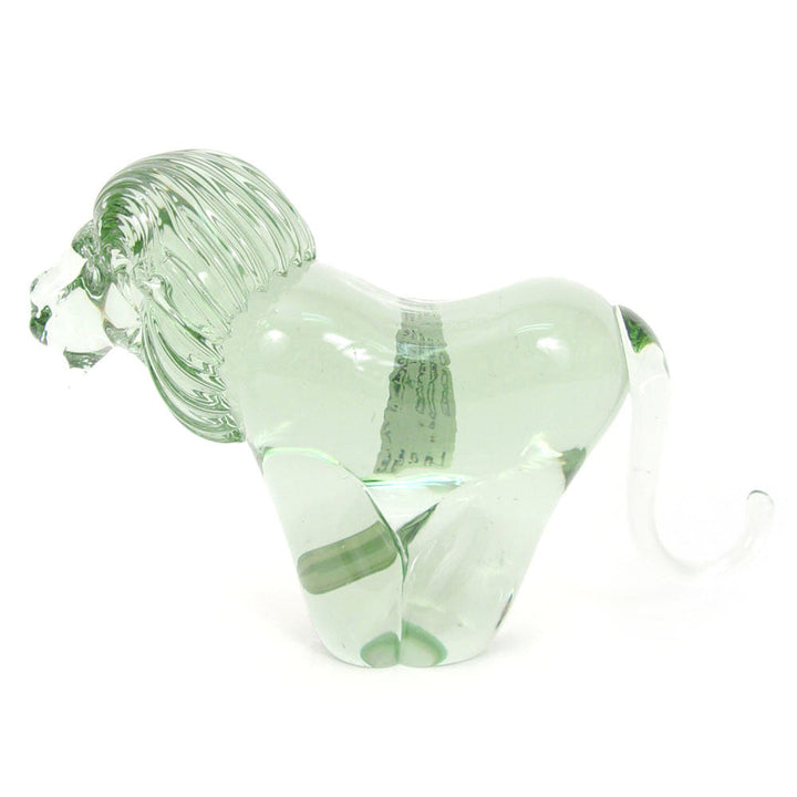 Translucent green recycled-glass lion figurine, side view, tail raised.