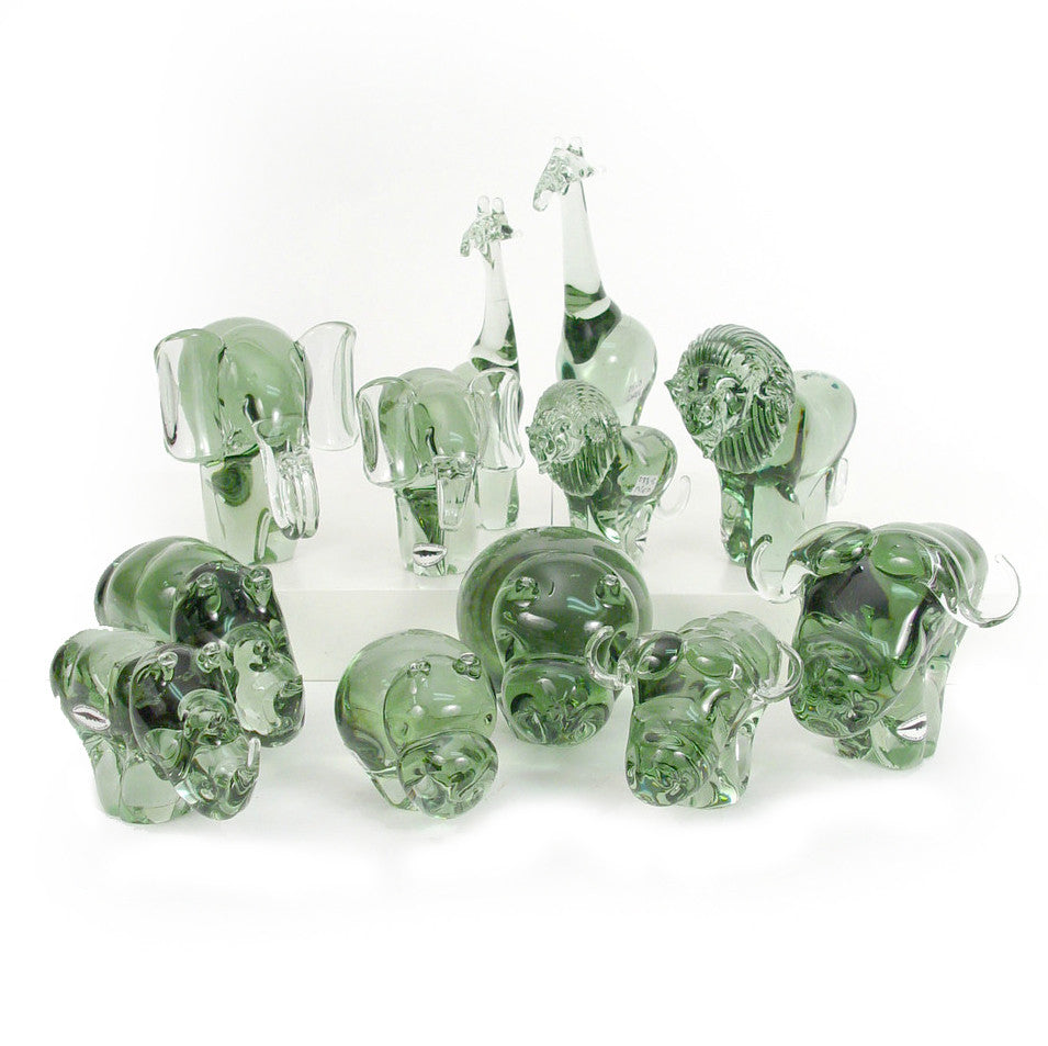 Green glass hippo figurine set, multiple small hippos gathered in a cluster