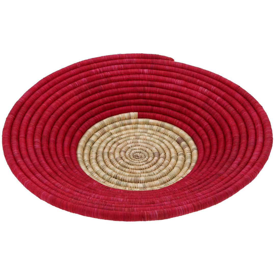 Round woven basket with red outer coil and beige spiral center
