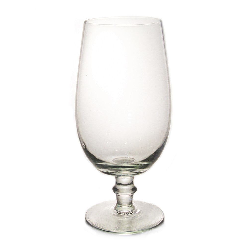 Clear glass goblet with tall flared bowl, ribbed stem, and round foot base