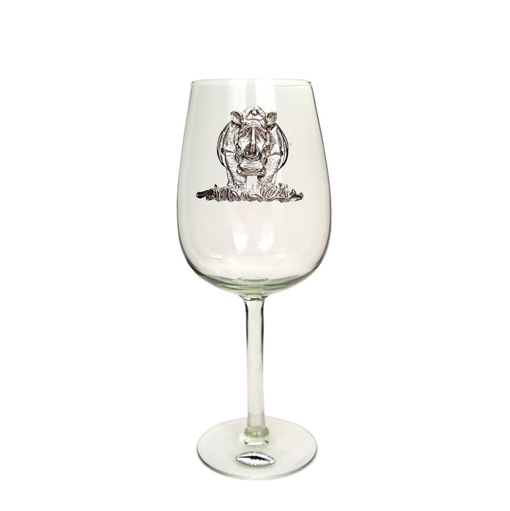 Clear wine glass with pewter lion motif on the bowl