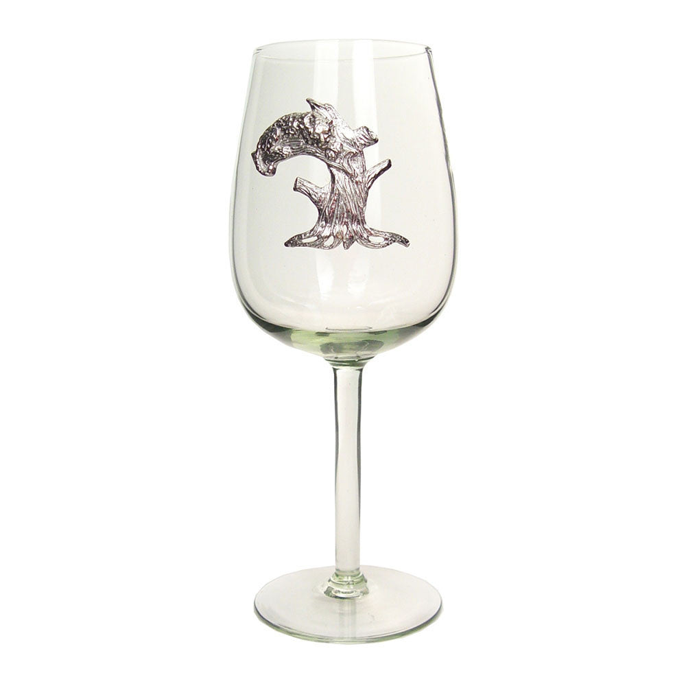 Clear wine glass with pewter giraffe motif on the bowl