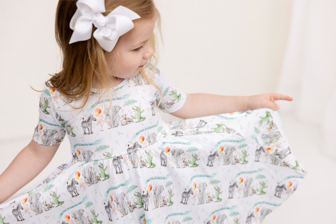 Kids organic cotton dress on girl, animal print, round neckline, short sleeves, gathered hem