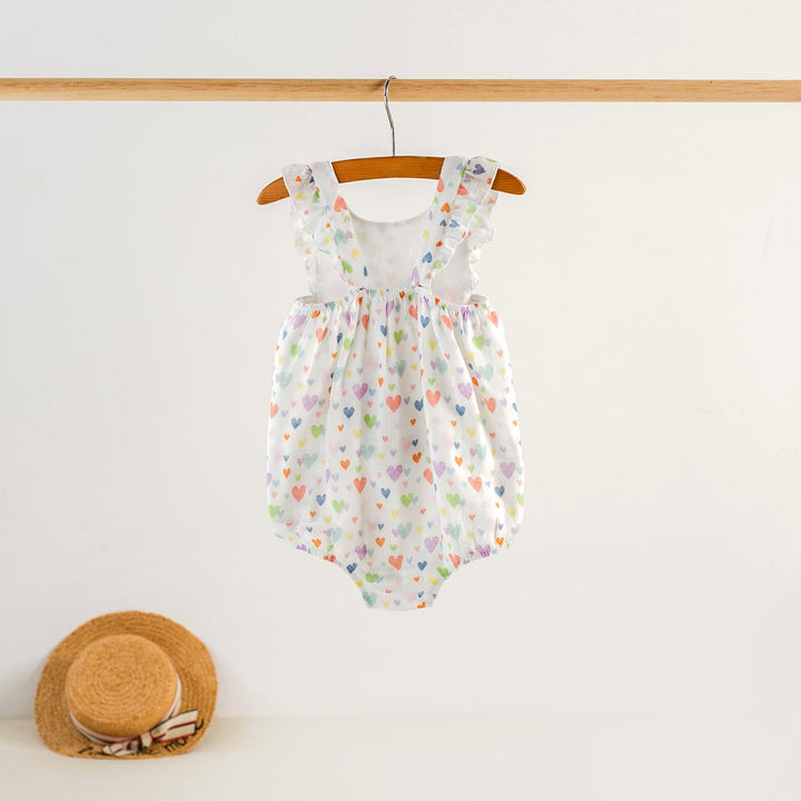 Heart-print muslin bubble romper with flutter ruffle sleeves and gathered waist