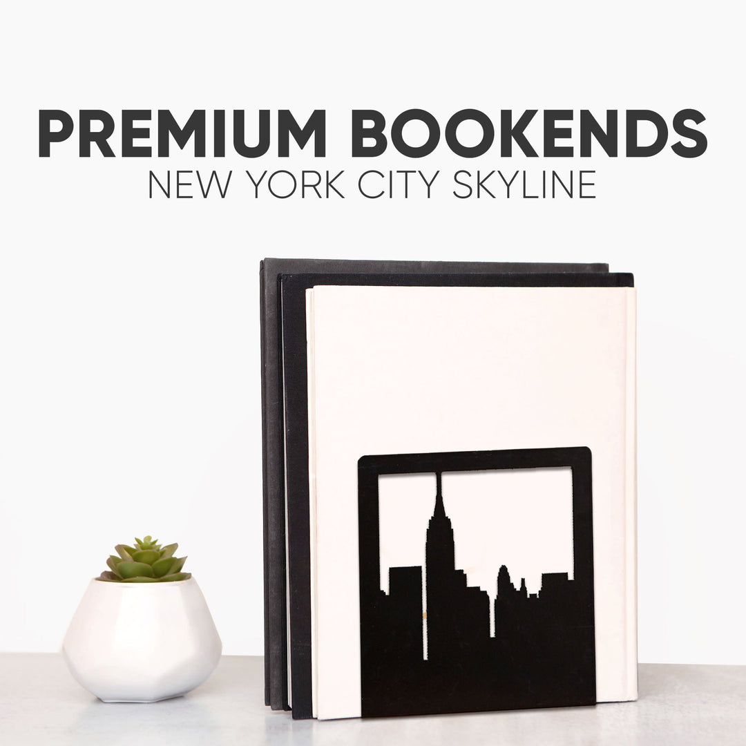 Metal skyline bookend set holding books, black silhouette design on dark base