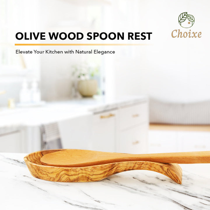 Carved olive wood spoon rest with shallow oval basin and curved end