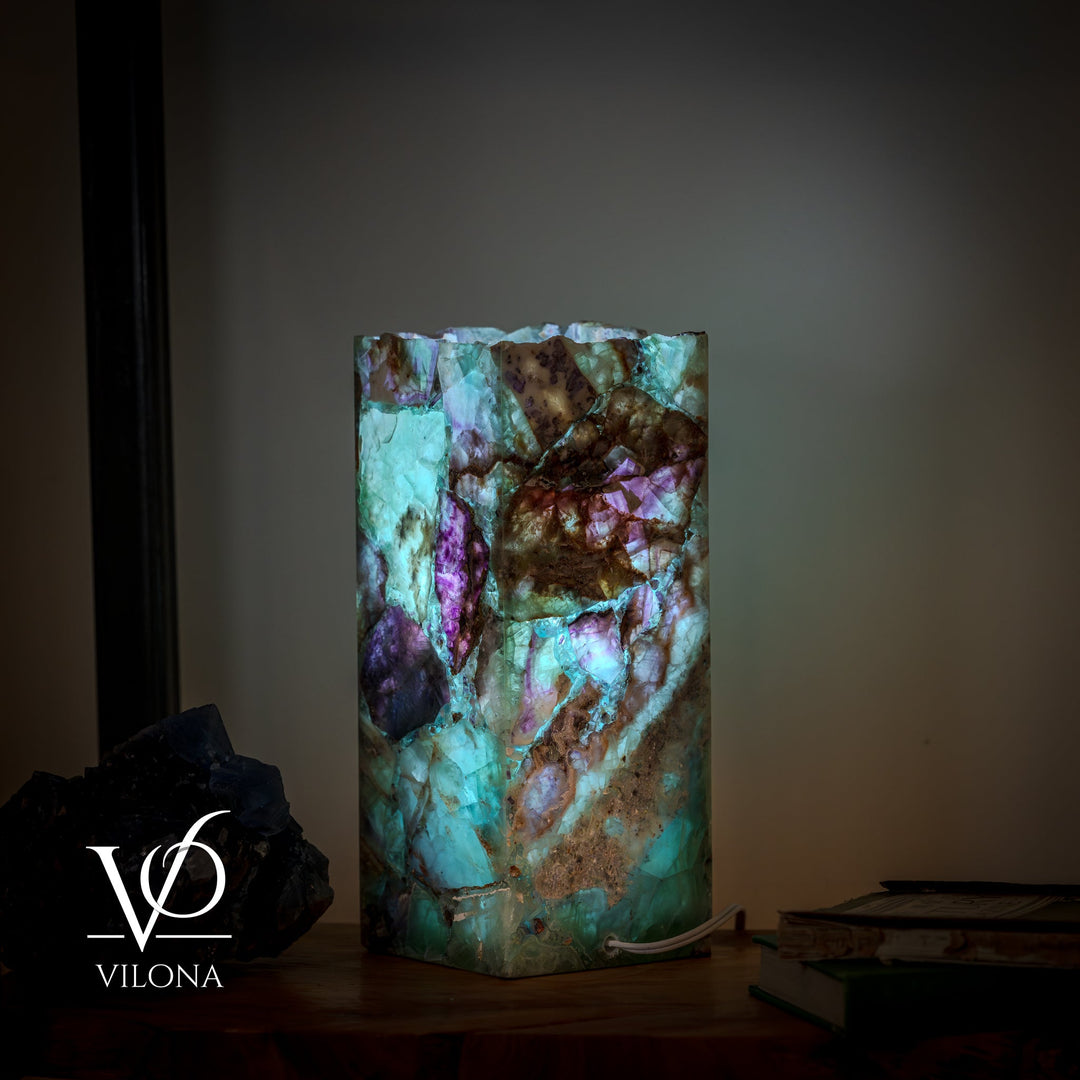 Fluorite table lamp with square crystal shade, teal glow with dark brown and purple areas