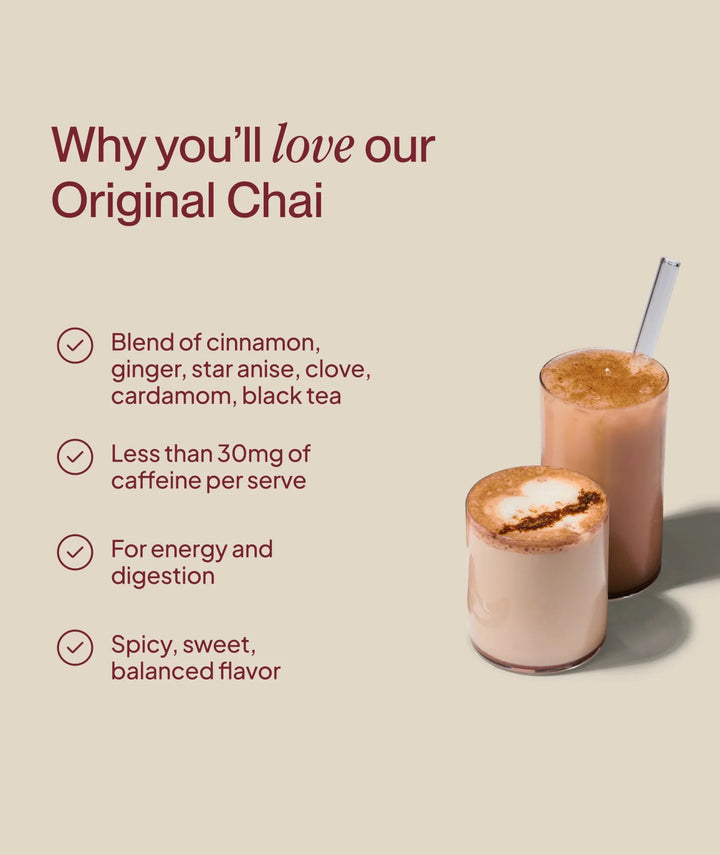 Pair of chai latte cups with straws, warm and frothy surface