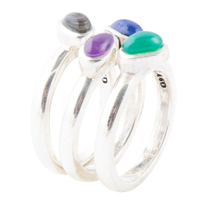 Sterling silver ring set with purple, teal and blue oval stones, stacked bands