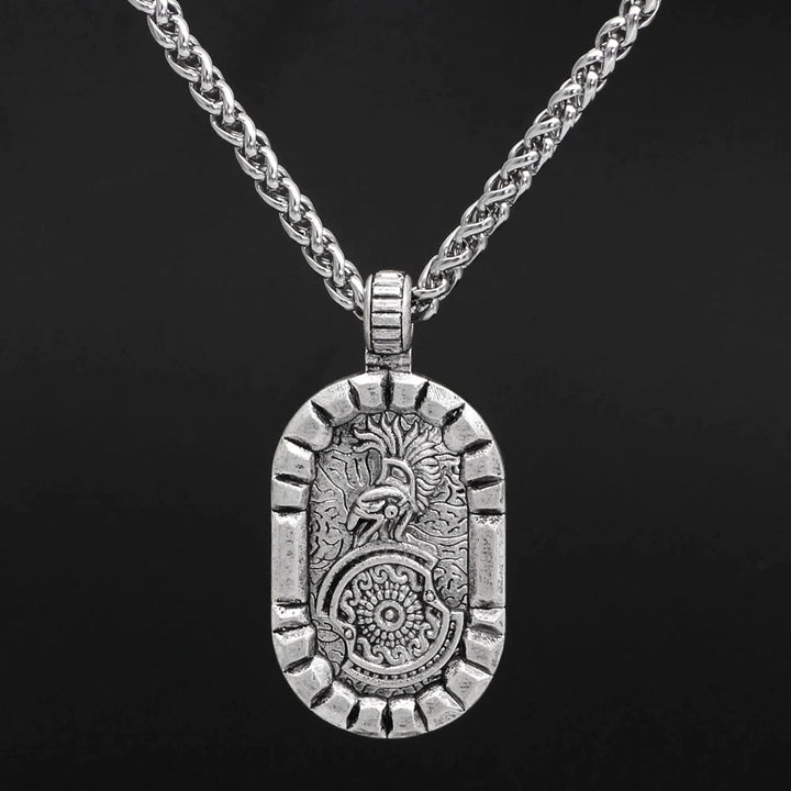 Stainless steel pendant necklace with oval lion and shield emblem on a chain