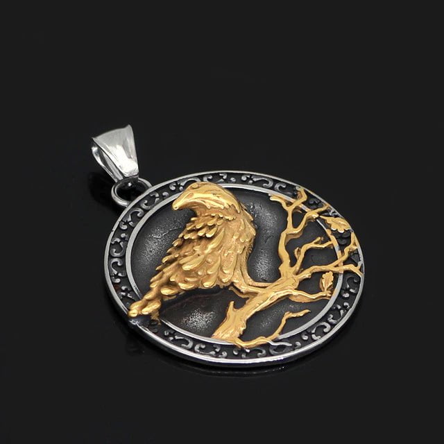 Silver-tone circular raven-and-tree pendant with bail, on stainless steel necklace chain