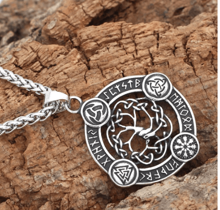 Stainless steel pendant necklace with round Celtic knot medallion and engraved symbols on chain