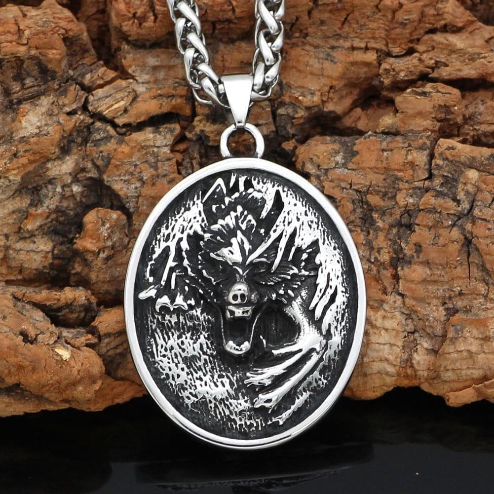 Stainless steel oval wolf pendant with chain, engraved head and full body detail.