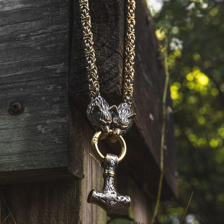 Viking wolf-head Mjolnir pendant necklace with gold-tone chain and silver hammer