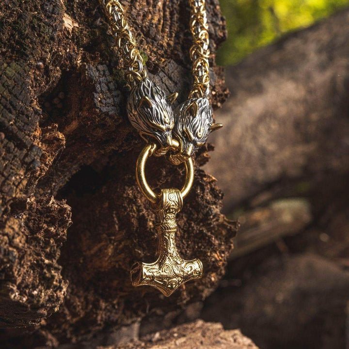 Viking wolf-head Mjolnir pendant necklace on a gold-tone chain