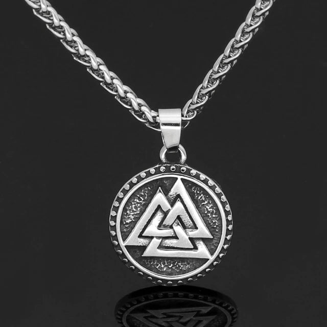 Stainless steel necklace with twisted chain and round Valknut pendant with dot border.