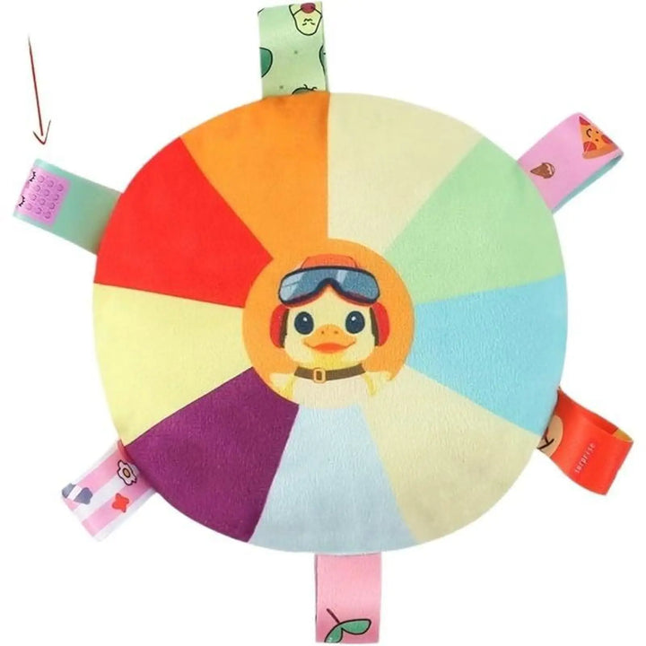 Colorful plush flying disc chew toy with stitched animal face and dangling fabric tags
