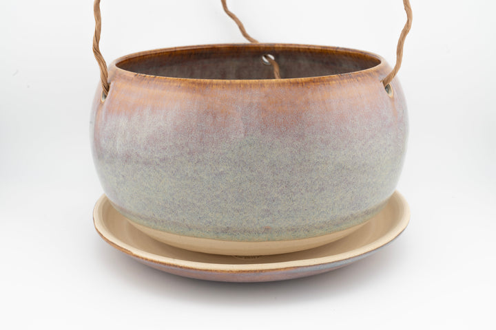 Glazed hanging planter with rope handles and round saucer base, grayish blue