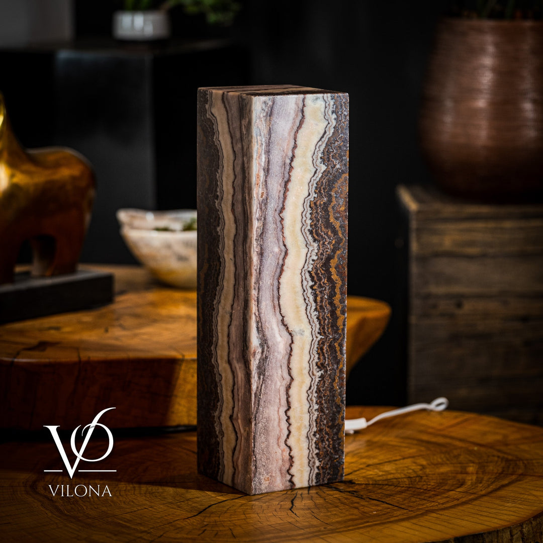 Rectangular onyx-style table lamp body with light gray to dark bands and visible power cord