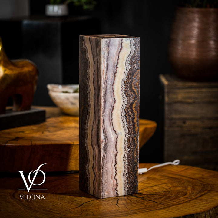 Rectangular onyx-style table lamp body with light gray to dark bands and visible power cord