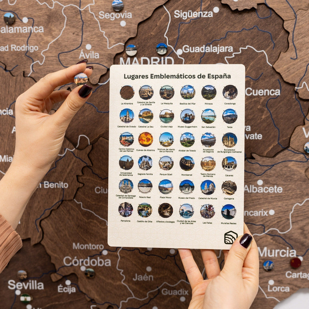 Dark walnut wooden Spain map with pins and landmark guide card