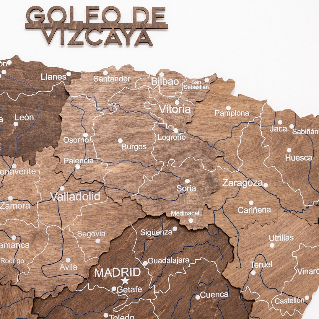 Dark walnut wooden Spain map with city labels, borders, and route lines