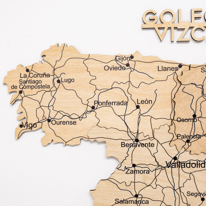 Gold wooden Spain map segment with city names and road lines, raised wooden finish