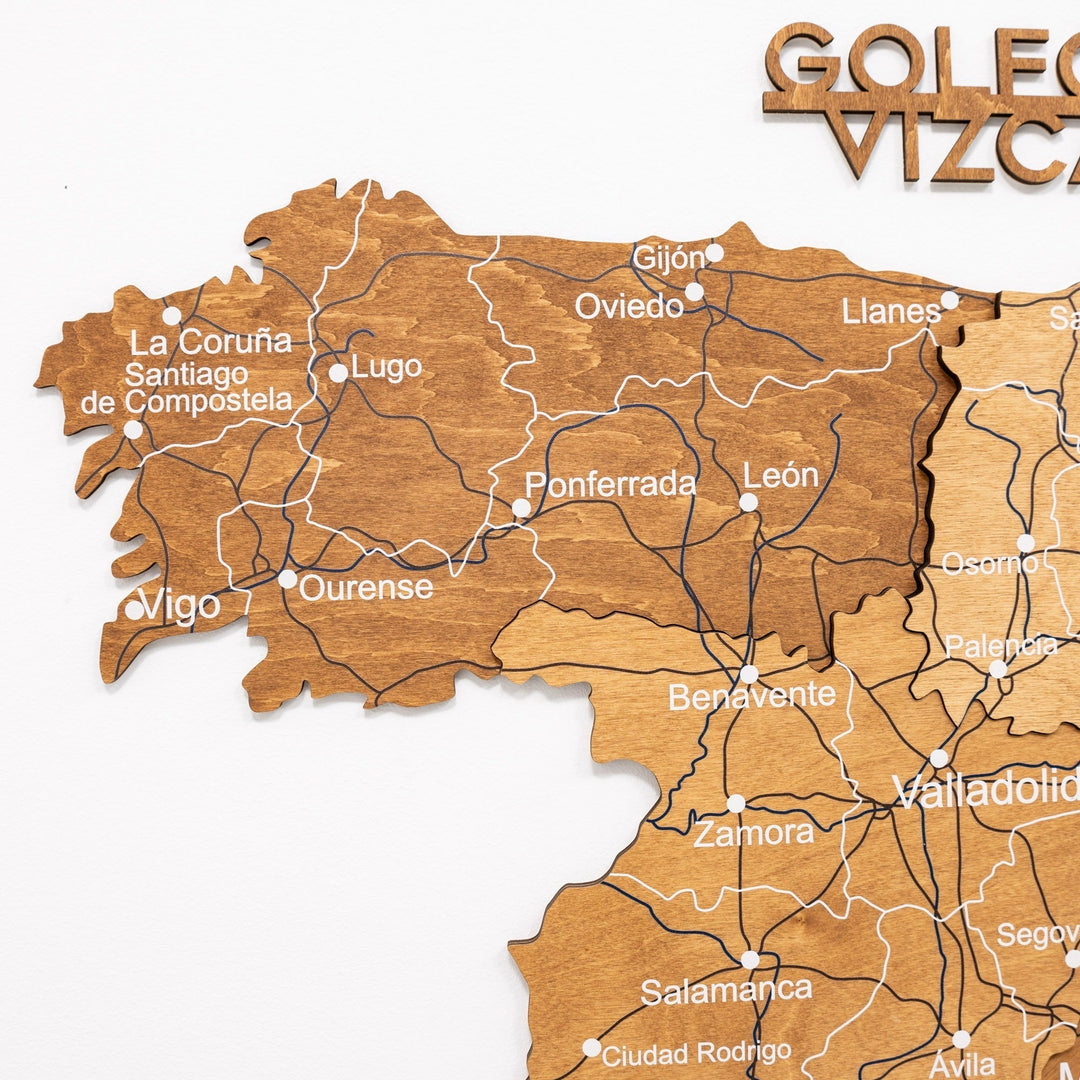 Oak wooden map of Spain with engraved borders, roads, and city names in the north region