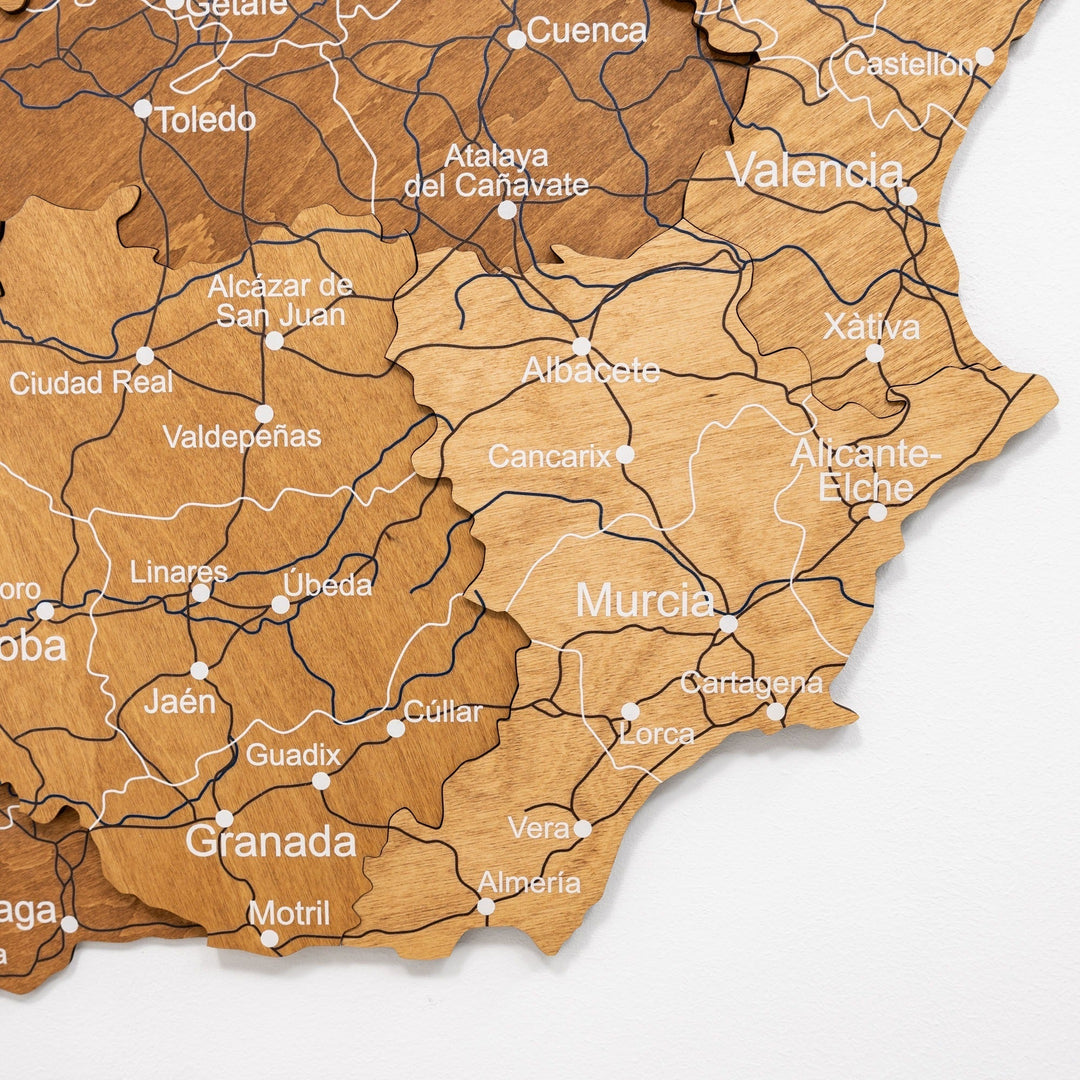 Oak wooden map of Spain with engraved roads and labels across the Valencia and Murcia regions