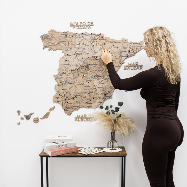 Wooden Spain map wall decor with engraved routes, city names, and island pieces