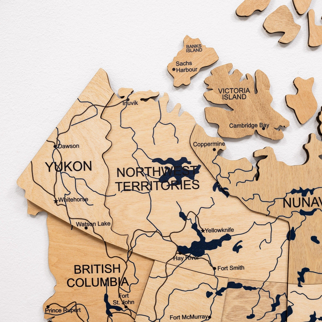 Close-up of wooden 3D Canada map featuring Yukon, Northwest Territories, and British Columbia