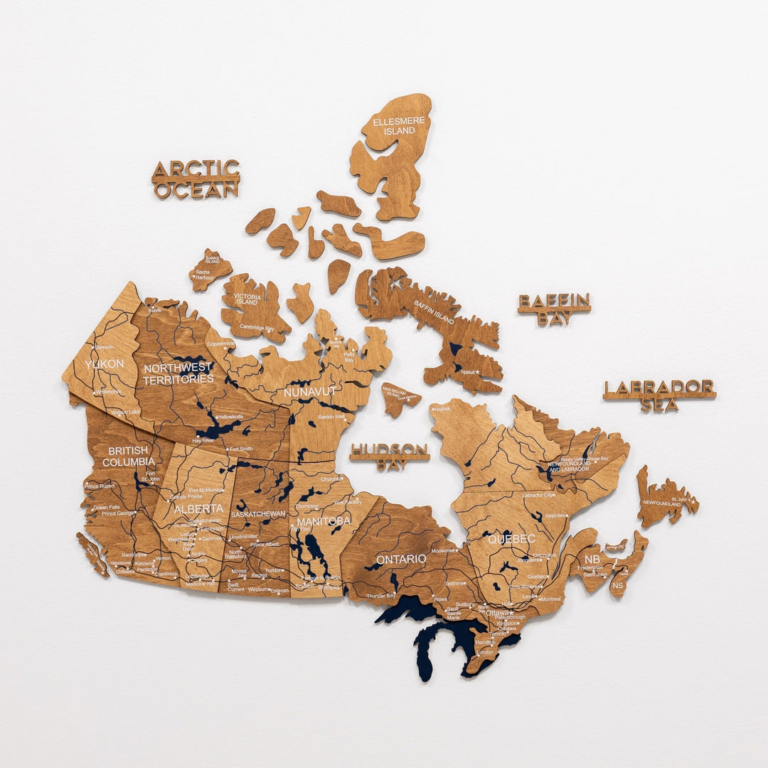 3D wooden Canada wall map with carved land pieces and blue inset waterways