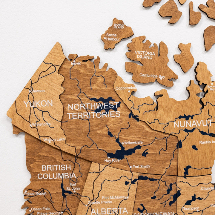 3D wooden Canada wall map close-up with carved province names and blue river inlays